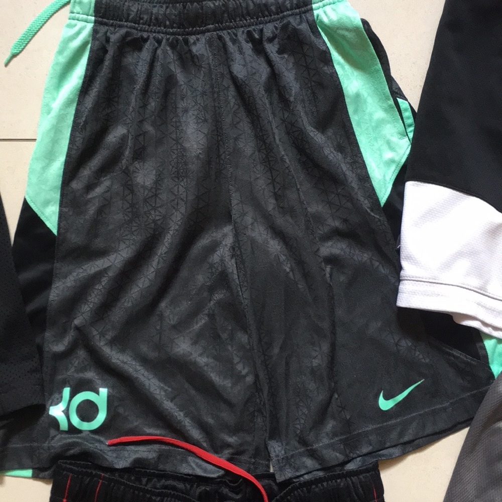 3 pair Nike boys shorts. Size medium.